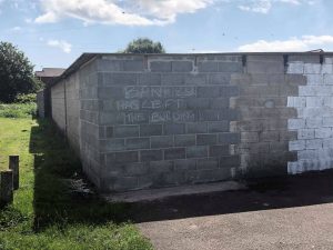 Banksy painting "Season's Greetings" in Port Talbot is removed from the garage